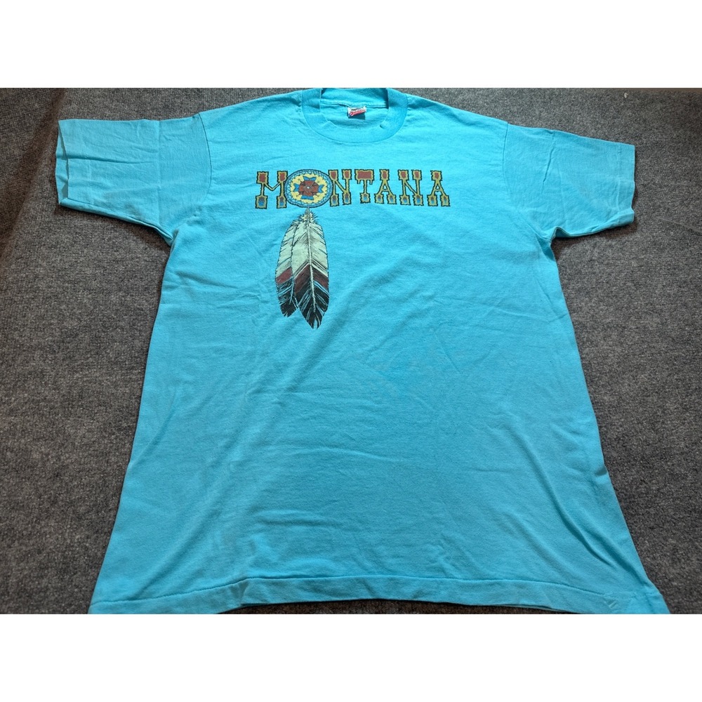 Vintage 90s Montana Feather Graphic T-Shirt Fruit of the Loom XL Made in USA